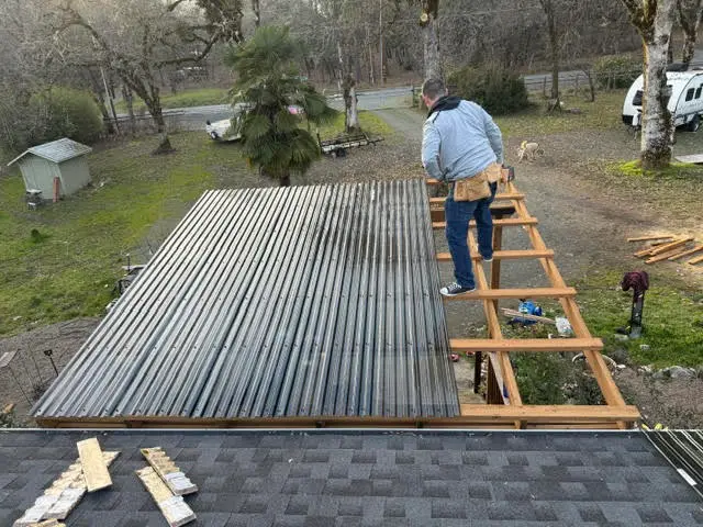 Corrugated metal patio roof installation near Eagle Point OR – RP Construction Management